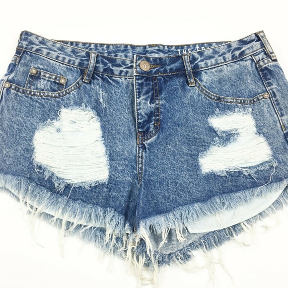 tattered denim shorts